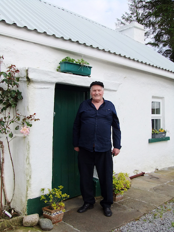 Danny Meehan outside his restored family home in Donegal, June 2012. Photograph by Sara Goek.